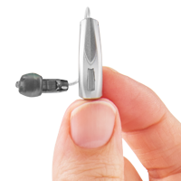 Receiver-In-Canal Hearing Aid Shown In Hand